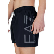 Ea7 men black polyester swim trunks with bold white pixelated logo, matching drawstring, and functional pockets