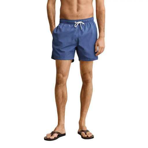 Gant men swimwear light blue polyamide board shorts with white drawstring waistband for beach and pool use