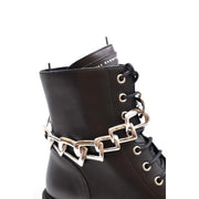Die schwarzen Leder-Ankle-Boots von Giuseppe Zanotti für Damen mit Reißverschluss verfügen über einen silbernen Kettenriemen am Knöchel.