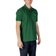 Green Lacoste polo shirt with classic collar and signature crocodile logo on the chest