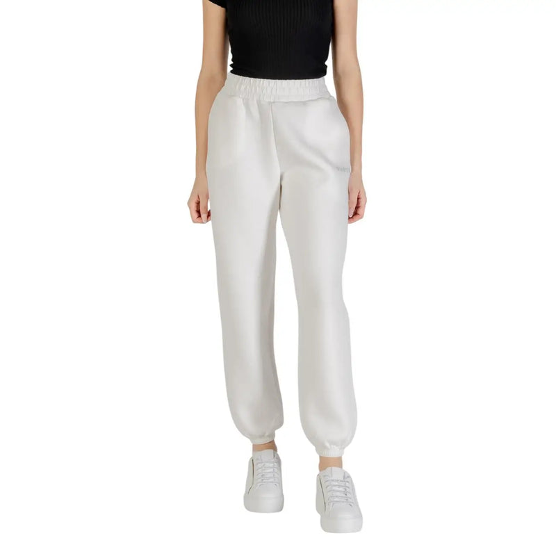 Women’s white leather-look sweatpants displayed with Guess Active Women Black Printed Trousers with Laces