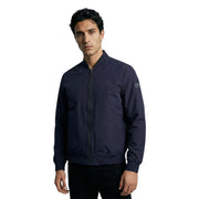 Marineblau Guess Damen-Bomberjacke aus Polyester mit dezentem, gesticktem Logo und Reißverschlusstaschen in einem eleganten Design