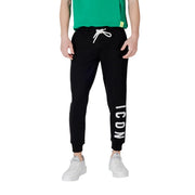 Icon Schwarze, gestreifte Herren-Freizeithose aus Baumwollmischgewebe mit schwarzem Jogginghosen-Schnitt, weißem Kordelzug und vertikalen Streifen. icon Beschriftung