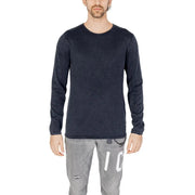 Navy blue long-sleeved thermal shirt with ribbed cuffs and hem, likely made of polyester or cotton blend.
