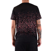 Schwarzes Kurzarmhemd Karl Lagerfeld Männer t-shirt mit rosa und silbernen Glitzerpartikeln, die von den Schultern zum Saum hin auslaufen.