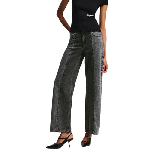 Woman wearing Karl Lagerfeld Black Cotton Jeans with two-tone wash and black slingback heels
