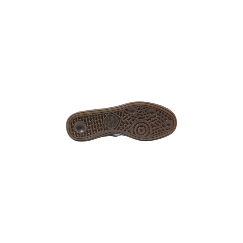 Brown rubber sole with textured pattern and adidas logo on light blue leather women spring summer slip on sneakers