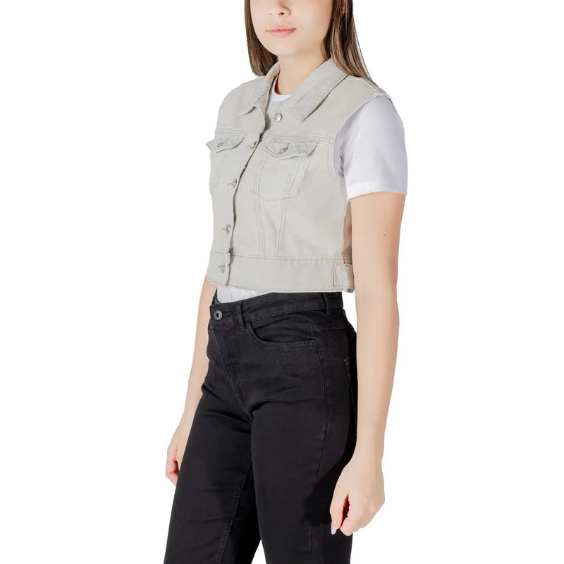 Light gray denim vest with classic collar front button closure and two chest pockets made of durable denim material