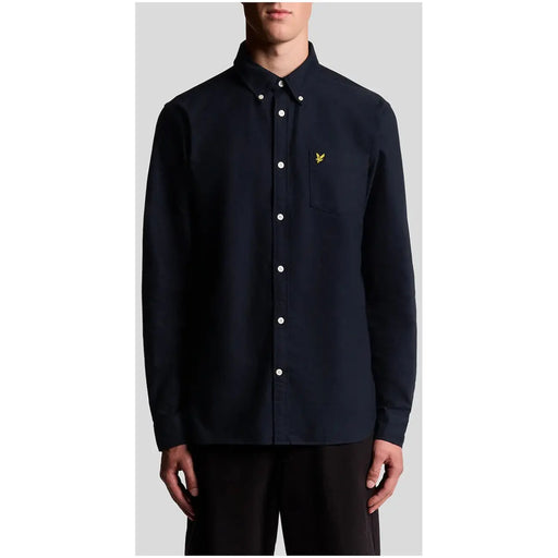 Men’s navy blue long-sleeved cotton shirt with yellow bird logo and single pocket