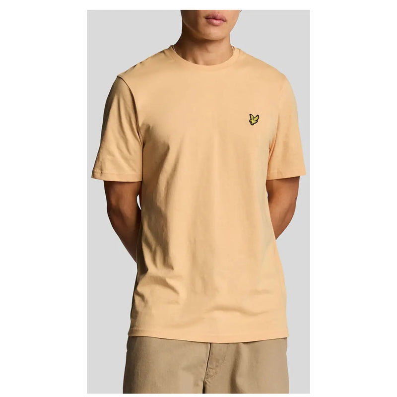 Lyle & Scott Beigefarbenes Herren-Kurzarmshirt mit Rundhalsausschnitt t-shirt mit gesticktem gelbem Vogellogo auf der linken Brust