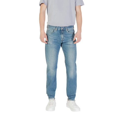 Man wearing Light Blue Denim Jeans and Gray T-Shirt displayed in Men’s Light Blue Denim Jeans product image