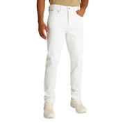 White denim jeans featured in a men’s tan T-shirt outfit display