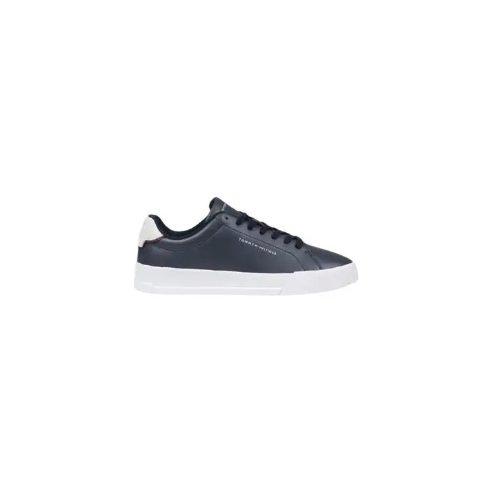 Navy and white Tommy Hilfiger leather sneaker with white sole displayed in product image