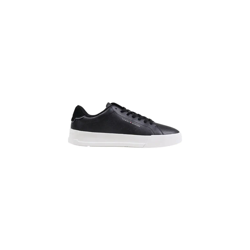 Black leather low-top sneaker with white sole and laces, classic design.