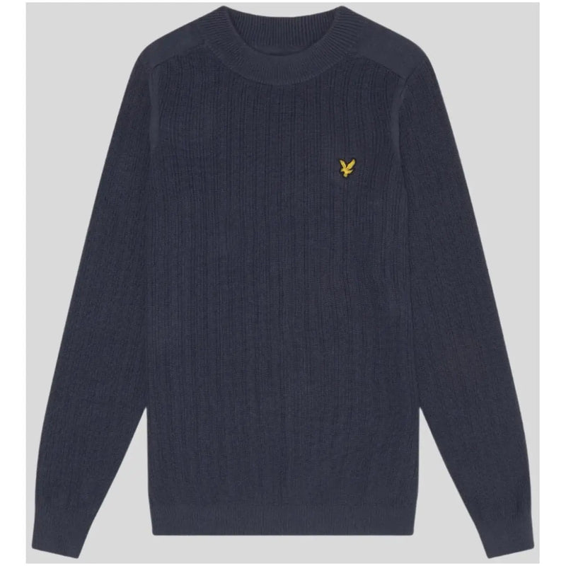 Navy blue ribbed knit sweater featuring a small gold bird logo on the chest, made from soft textured fabric