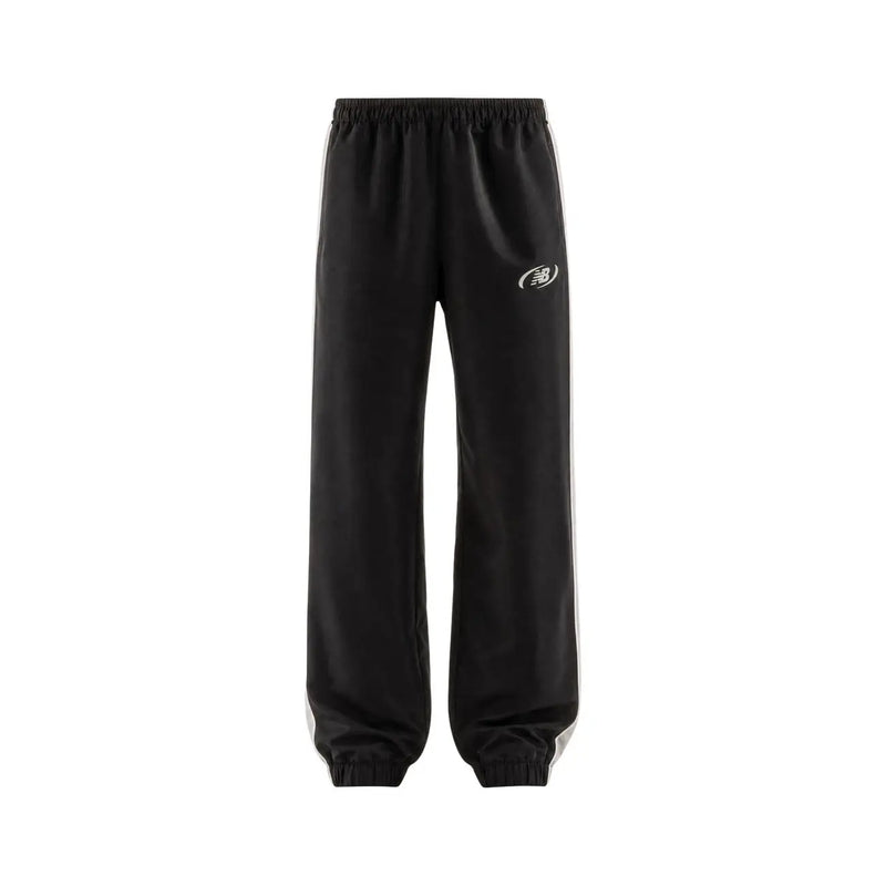 New Balance Schwarze Herren-Jogginghose aus Polyester mit weißen Seitenstreifen und dezentem Logo für Herbst und Winter