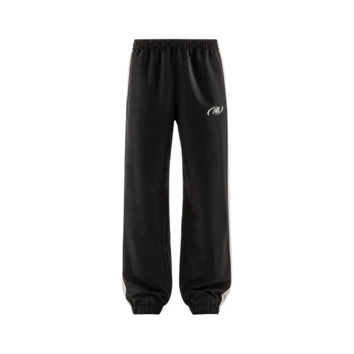 New Balance Schwarze Herren-Jogginghose aus Polyester mit weißen Seitenstreifen und dezentem Logo für Herbst und Winter