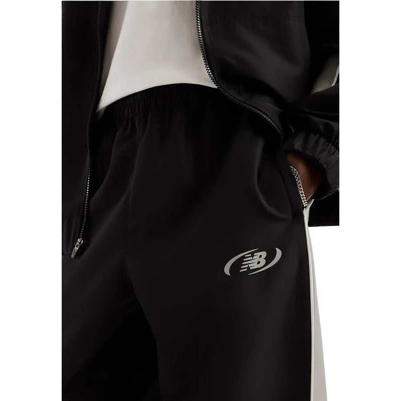 New balance Herrenhose aus schwarzem Polyester mit silbernem Logo und weißem Seitenstreifen für Herbst und Winter