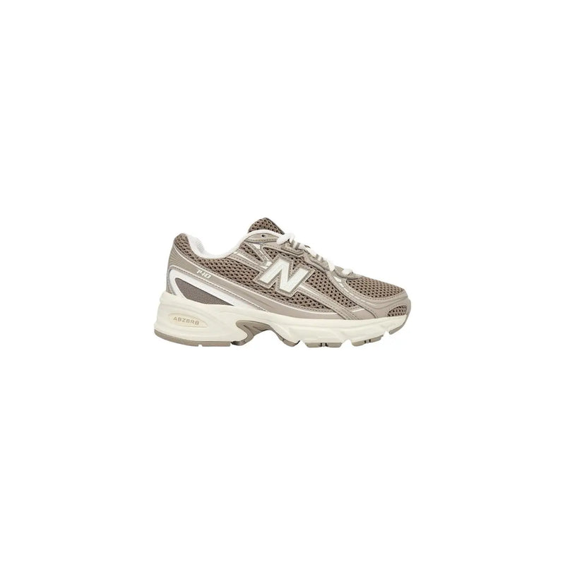 New Balance Graue Damen-Sneaker aus Textil mit grauem Mesh-Gewebe, weißen Akzenten und einer klobigen Sohle