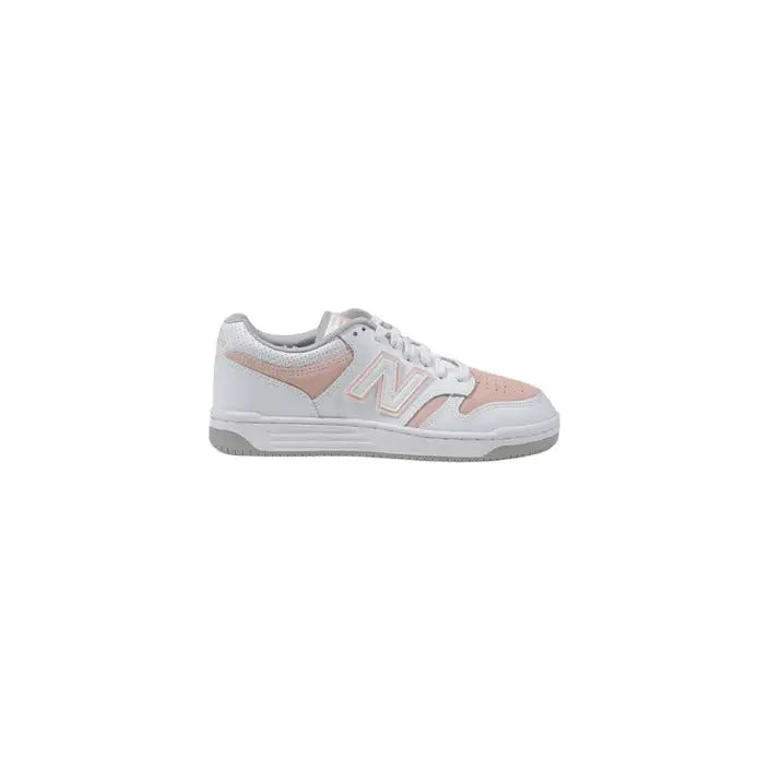 White and pink New Balance women’s sneakers size 3 on display