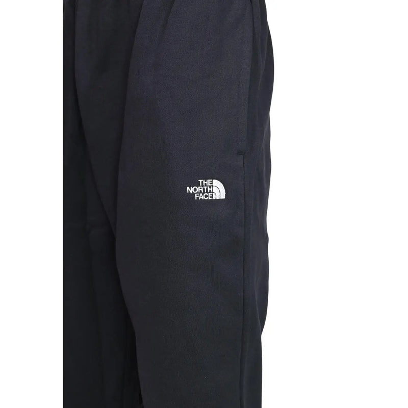Schwarze Jogginghose aus Baumwollfleece von The North Face für Herren mit weißem, gesticktem Logo am Oberschenkel