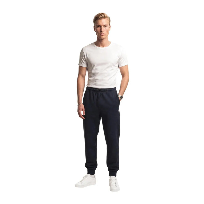 Schwarze Jogginghose aus Baumwollfleece für Herren von The North Face in Marineblau mit elastischem Bund und gerippten Bündchen