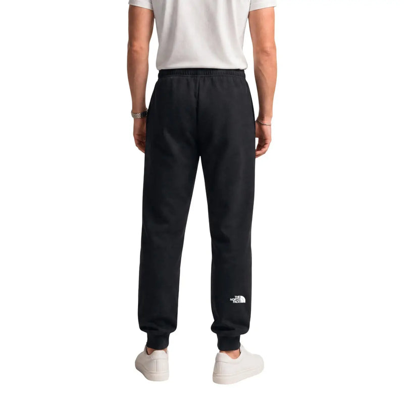 Schwarze The North Face Herren-Jogginghose aus Baumwollfleece mit weißem Logo am linken Bein