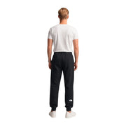 Die schwarzen Baumwollfleecehosen von The North Face für Herren im Jogger-Stil haben ein weißes Logo am linken Bein.