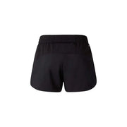 Die Rückseite der schwarzen North Face Damen-Sportshorts aus Polyester mit elastischem Bund und Reißverschlusstasche.