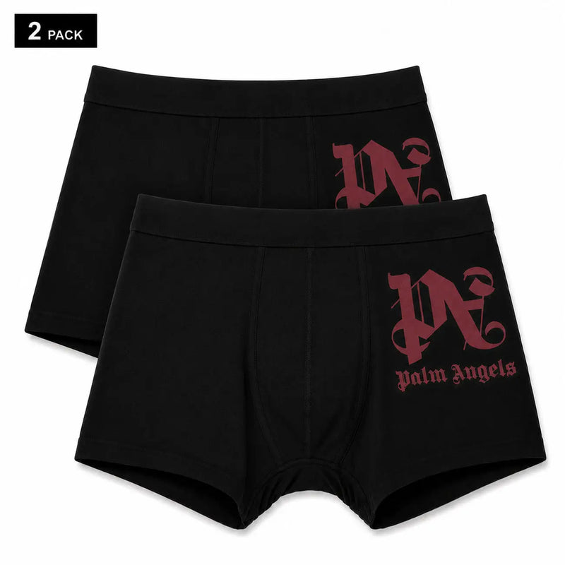 Schwarze Herren-Boxershorts aus Baumwolle mit bordeauxrotem PN-Logo und Palm Angels-Schriftzug an der Seite von Palm Angels