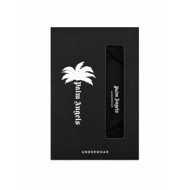 Palm Angels Herrenunterwäsche aus schwarzer Baumwolle, kurze Passform, präsentiert in einer eleganten schwarzen Box mit weißer Palme und Logo.