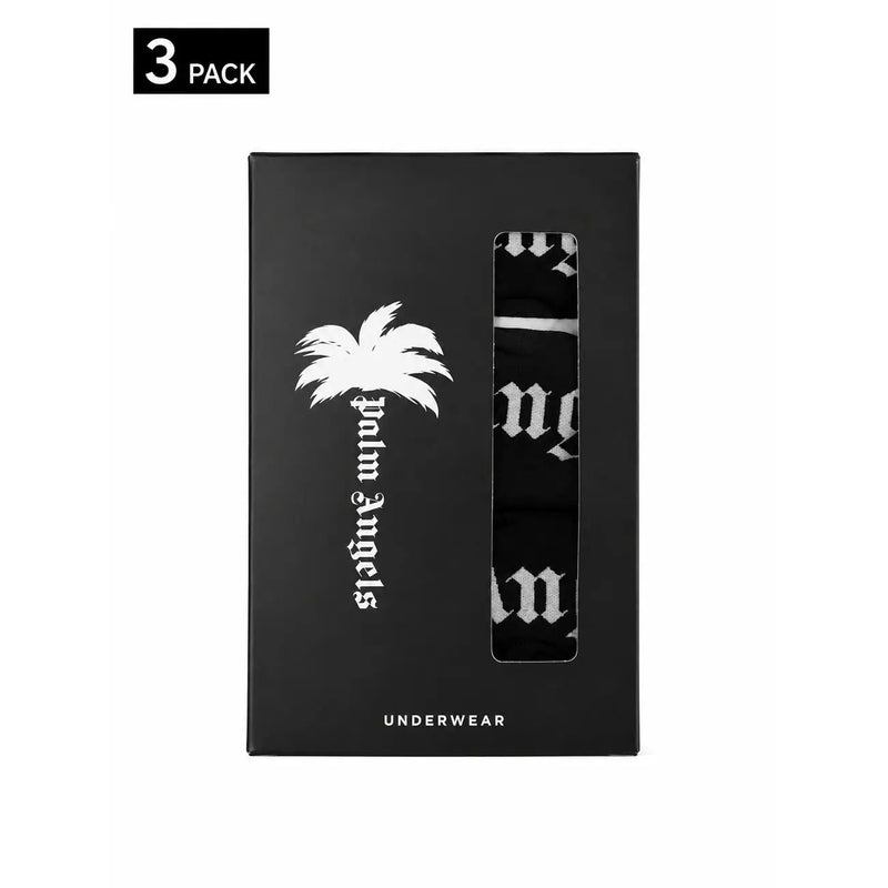 Schwarze Palm Angels Herren-Boxershorts aus weißem Baumwoll-Elastan, Set in schwarzer Box mit weißem Logo und drei gemusterten Paaren sichtbar