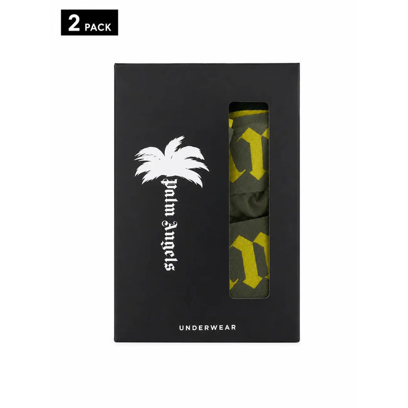 Schwarze Palm Angels Unterwäschebox mit zwei olivgrünen und gelb gemusterten Boxershorts aus dehnbarem Baumwollstoff.