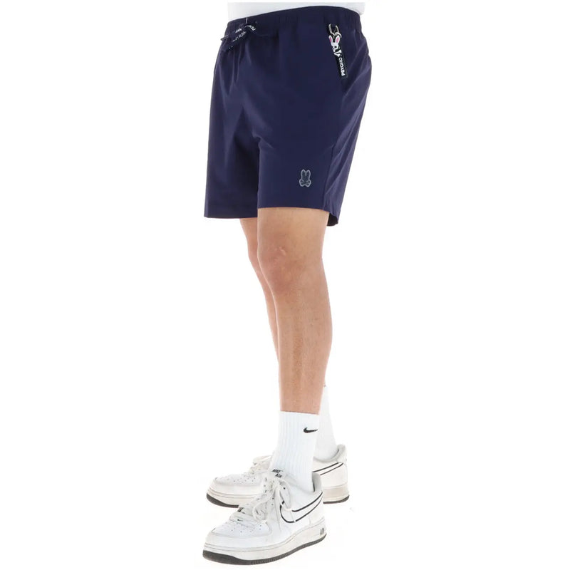 Navy blue Psycho Bunny men polyester athletic shorts with drawstring waistband and embroidered logos on the side and thigh