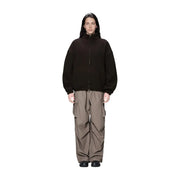 Schwarze Damen-Fleecejacke mit Reißverschluss von Rains, hohem Kragen und lockerer Passform aus braunem Polyester