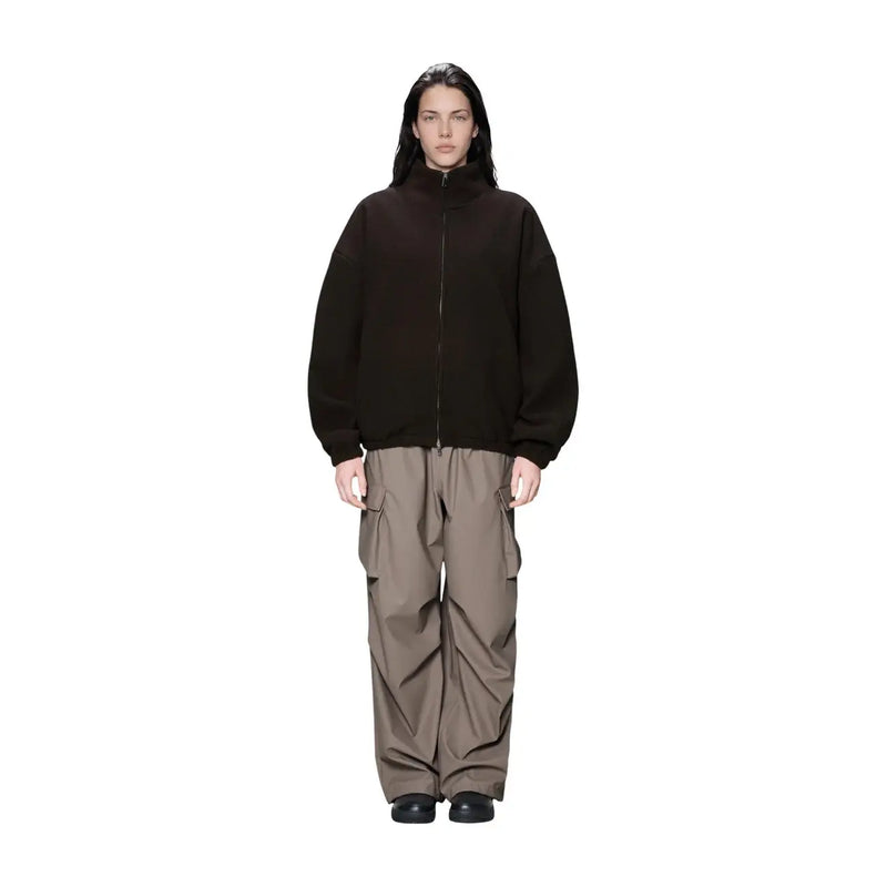 Schwarze Damen-Fleecejacke mit Reißverschluss von Rains, hohem Kragen und lockerer Passform aus braunem Polyester