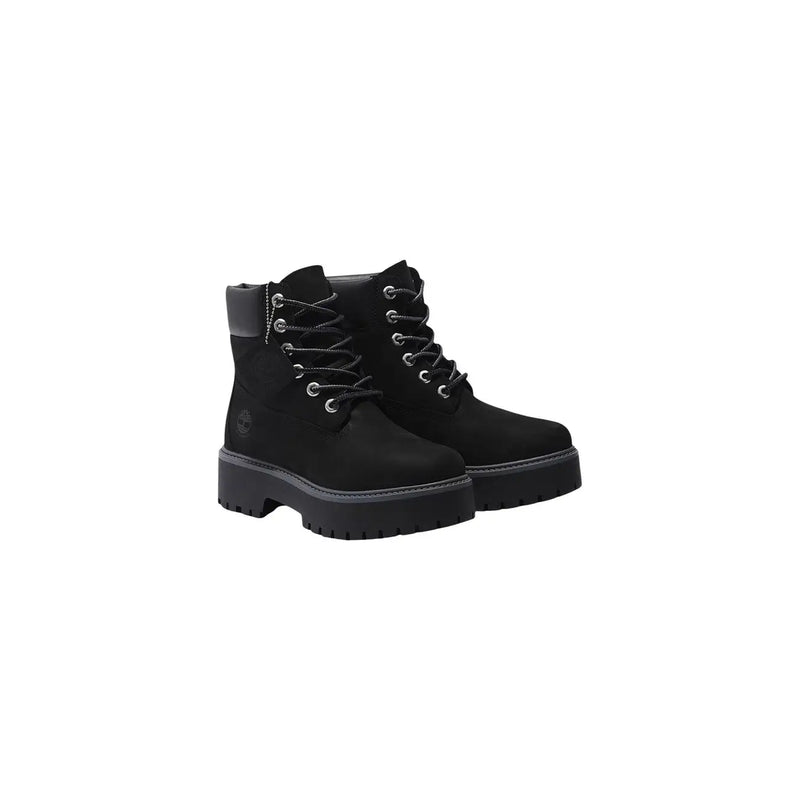 Timberland Schwarze, wasserdichte Damen-Lederstiefel mit Obermaterial aus Wildleder, silbernen Ösen und klobigen Gummisohlen.