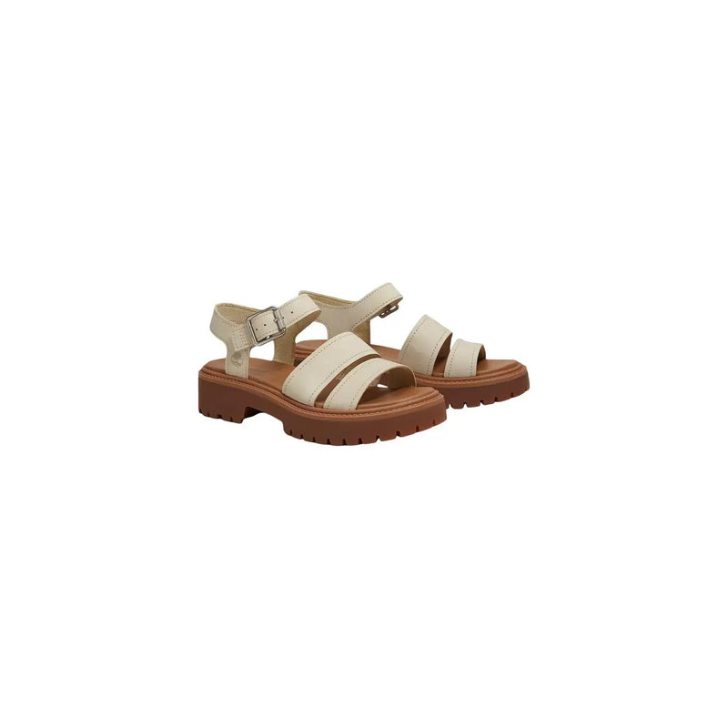 Timberland Damen-Ledersandalen, beige mit cremefarbenem Leder, klobiger brauner Sohle und verstellbaren Schnallenriemen.