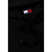 Schwarzer Tommy Hilfiger Jeans Herren-Hoodie aus Bio-Baumwolle mit klassischem rot-weiß-blauem Flaggenlogo am Halsausschnitt