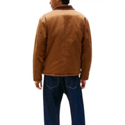 Men’s brown work jacket paired with dark blue jeans from Tommy Hilfiger Jeans collection