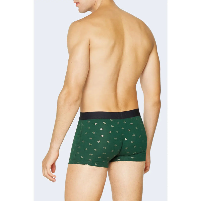 Dunkelgrün Tommy Hilfiger Herren-Boxershorts aus Bio-Baumwolle mit weißem geometrischem Muster und schwarzem Bund