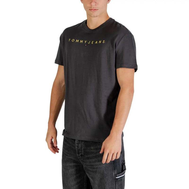 Schwarze Tommy Jeans t-shirt mit goldener Schrift auf der Brust in einem Tommy Hilfiger Herren grau Bio-Baumwolle t-shirt