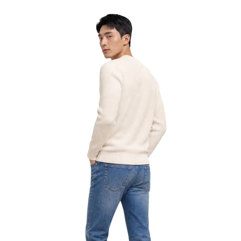 Cream-colored ribbed knit sweater made from organic cotton with a round neck by Tommy Hilfiger men knitwear