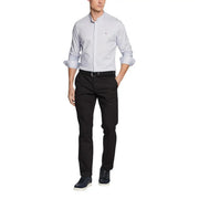 Light gray tommy hilfiger men button-down shirt with rolled-up sleeves and subtle chest logo paired with trousers