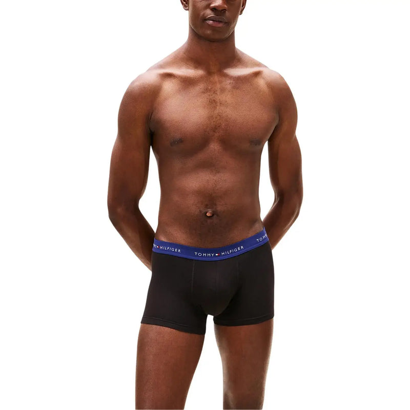 Tommy Hilfiger men underwear black boxer briefs with blue waistband featuring Tommy Hilfiger logo