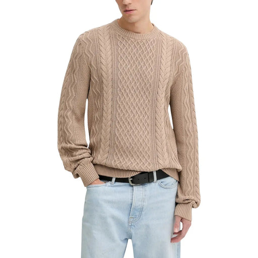 Beige cable knit sweater with a crew neck and ribbed cuffs, inspired by levi’s design.