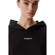 Schwarzer Tommy Hilfiger Damen-Hoodie aus Bio-Baumwolle mit weißem, gesticktem Logo auf der Brust