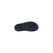 Rückansicht von schwarzen UGG-Damensandalen aus Polyurethan mit dunkelgrauer Gummisohle, geometrischem Profil und UGG-Logo.