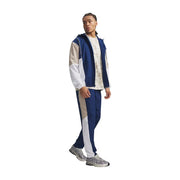 Under armour Herren-Trainingsanzug aus blauem Polyestergewebe mit weiß-blauem, farblich abgesetztem Kapuzenpullover mit kontrastierenden Einsätzen und Streifen