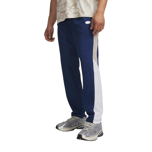 Under armour Herren-Hose aus blauem Polyestergewebe mit marineblauen und weißen Seitenstreifen und kleinem ovalen Logo am Bund